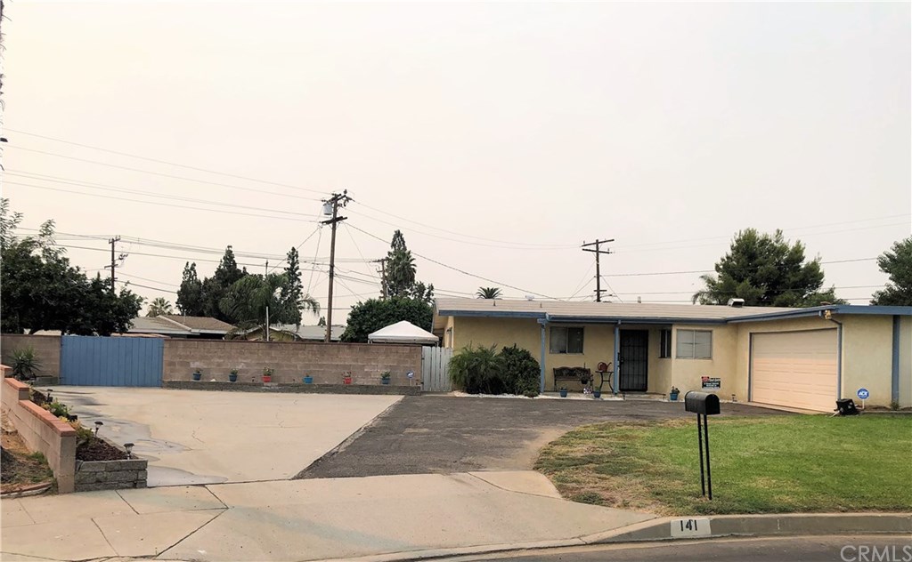 141 East Fromer Street Rialto, CA 92376 - Photo 1 of 21 Front of Home