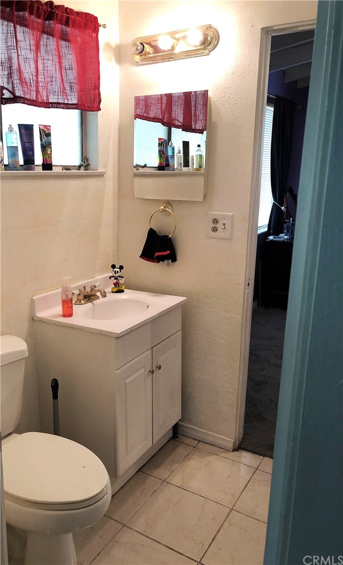 141 East Fromer Street Rialto, CA 92376 - Photo 12 of 21 Jack and Jill Bathroom