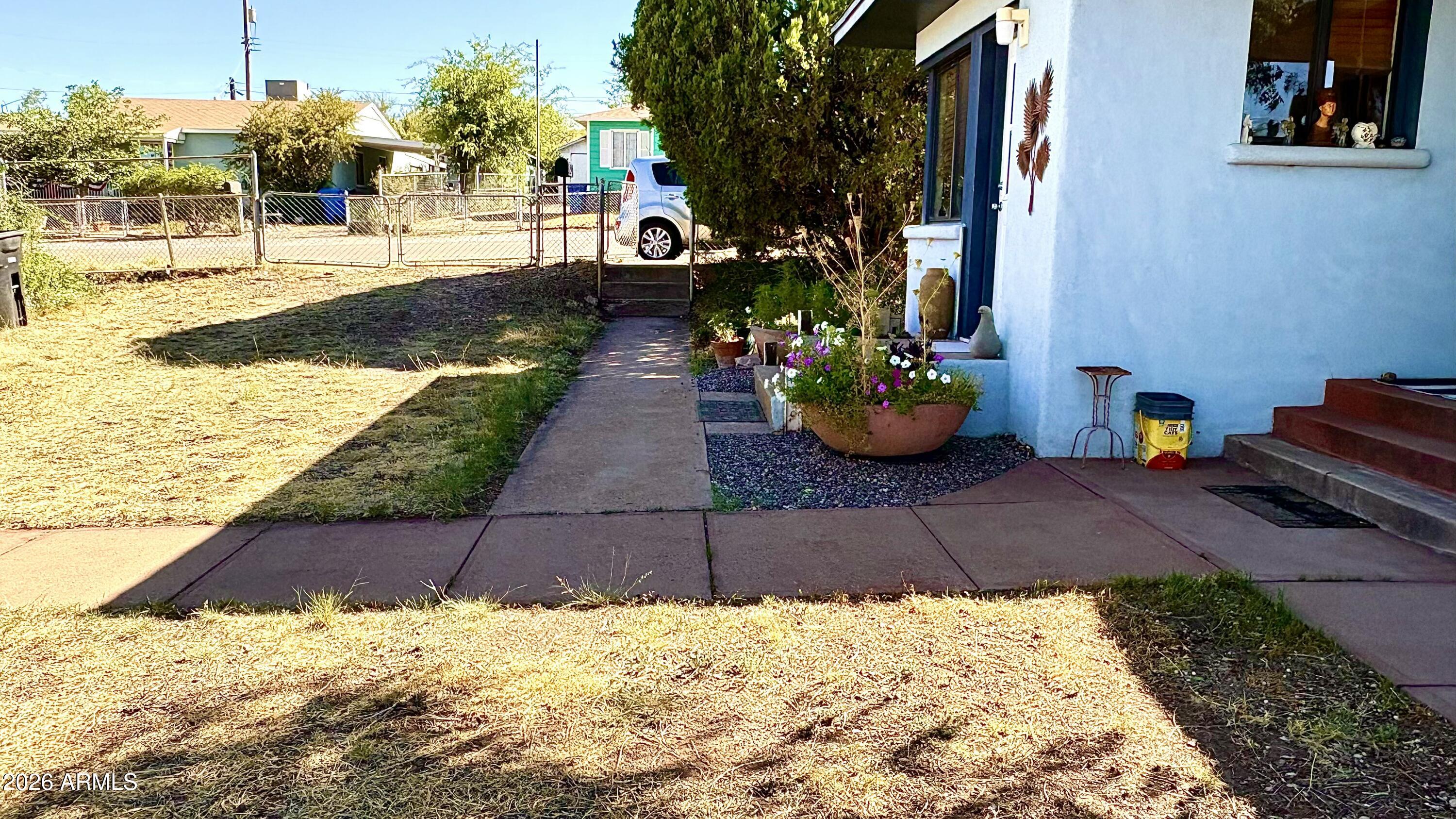74 Neptune Avenue Bisbee, AZ 85603 - Photo 20 of 22 Sidewalk