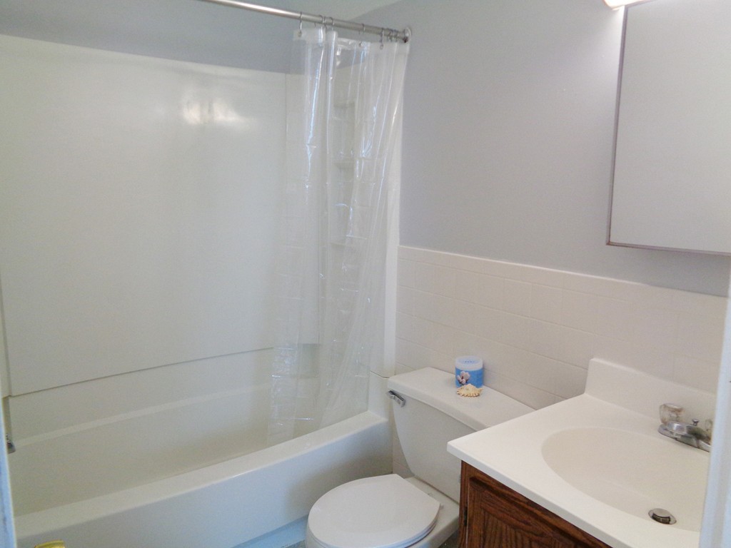 76 Stony Hill Road Wilbraham, MA 01095 - Photo 12 of 22 a white bath tub sitting next to a white toilet and sink