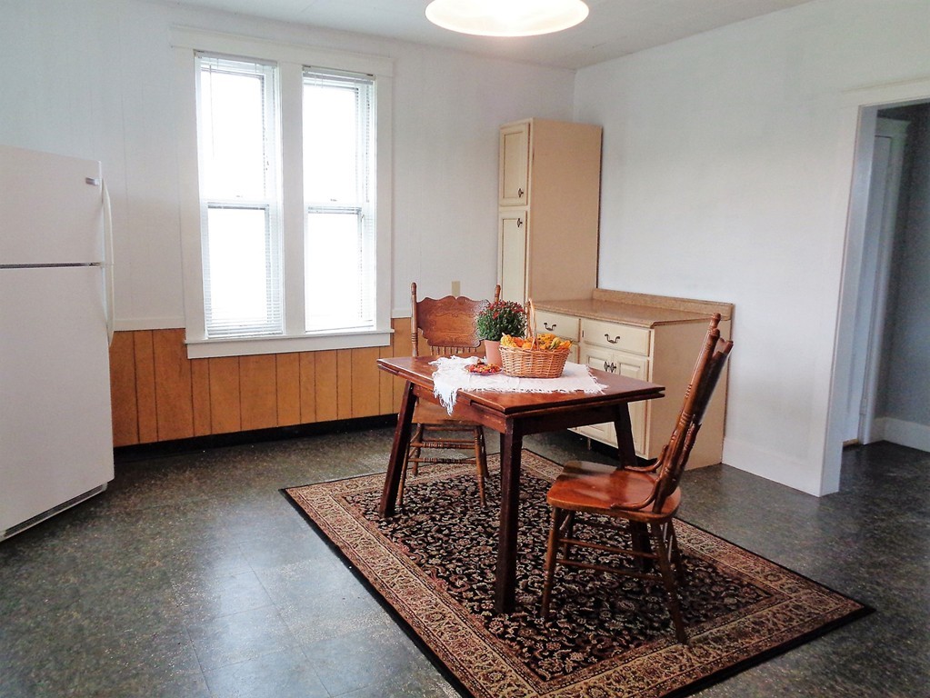 76 Stony Hill Road Wilbraham, MA 01095 - Photo 6 of 22 a dining room with furniture and wooden floor