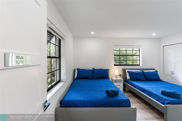 a kitchen with a sink and a washer dryer