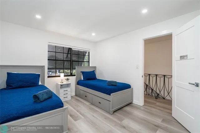 a view of a chairs and table in the patio