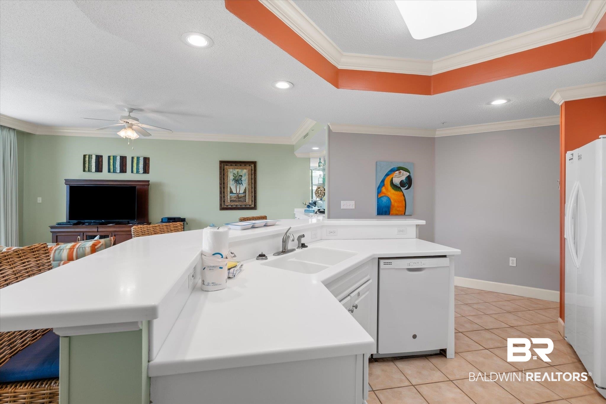 27580 Canal Road, Unit 1423 Orange Beach, AL 36561 - Photo 8 of 34 Kitchen featuring crown molding, light countertops, white appliances and recessed lighting.