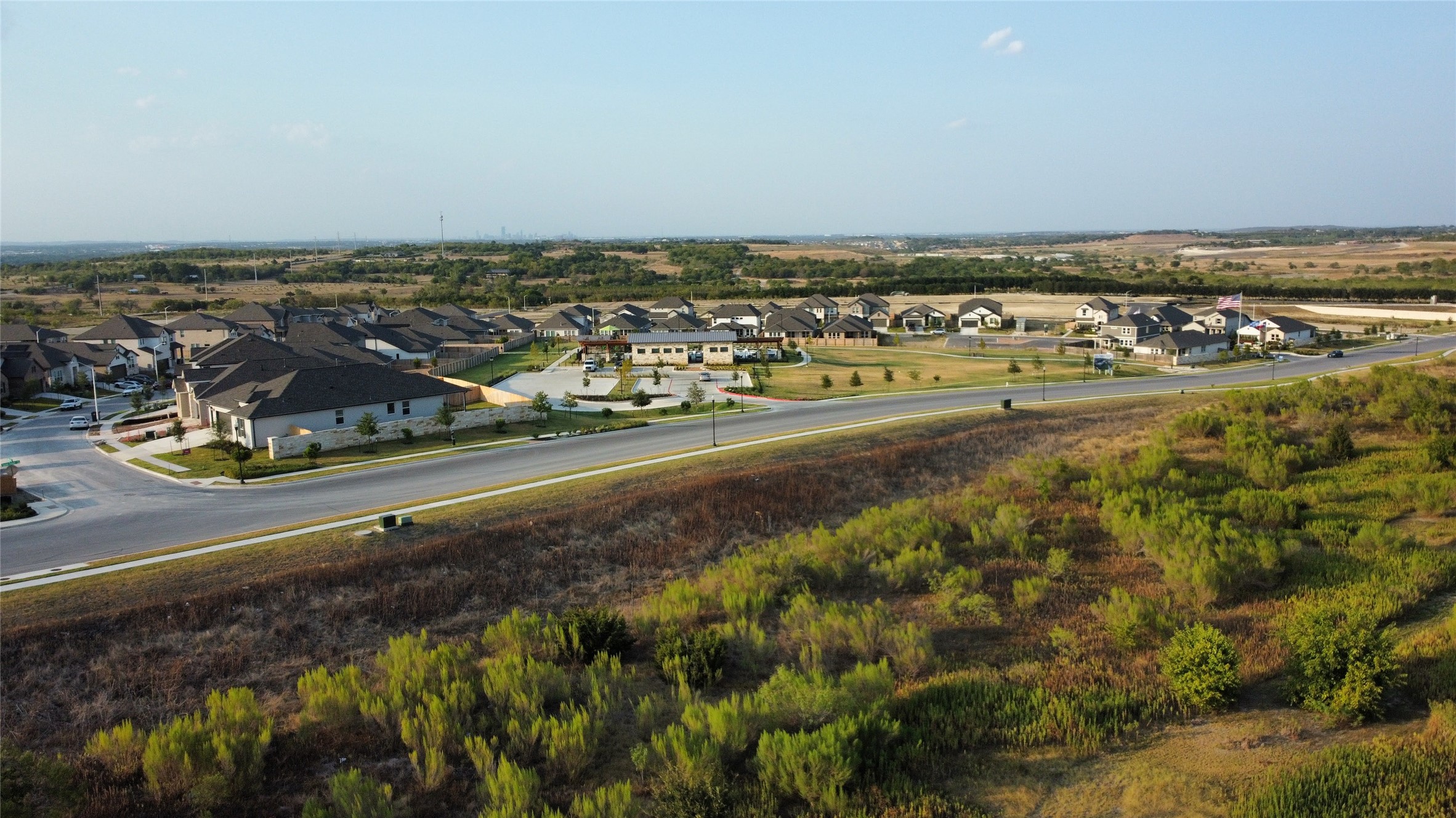 6400 Rounded Pebble Lane Buda, TX 78610 - Photo 18 of 34 a view of an ocean and beach