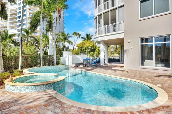 a view of a house with a swimming pool