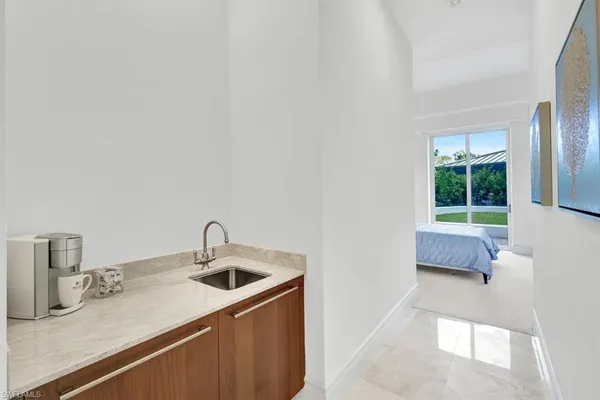 a kitchen with a sink and a window
