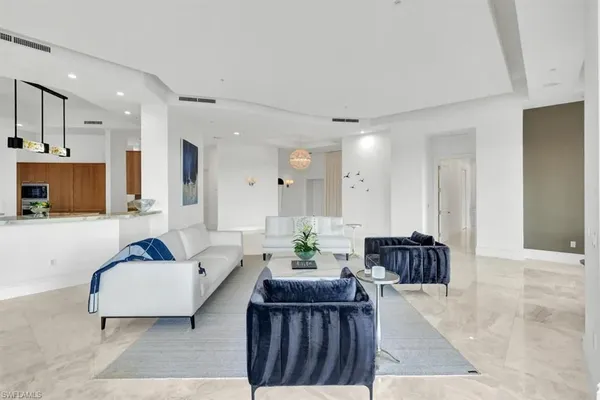 a living room with furniture and a couch