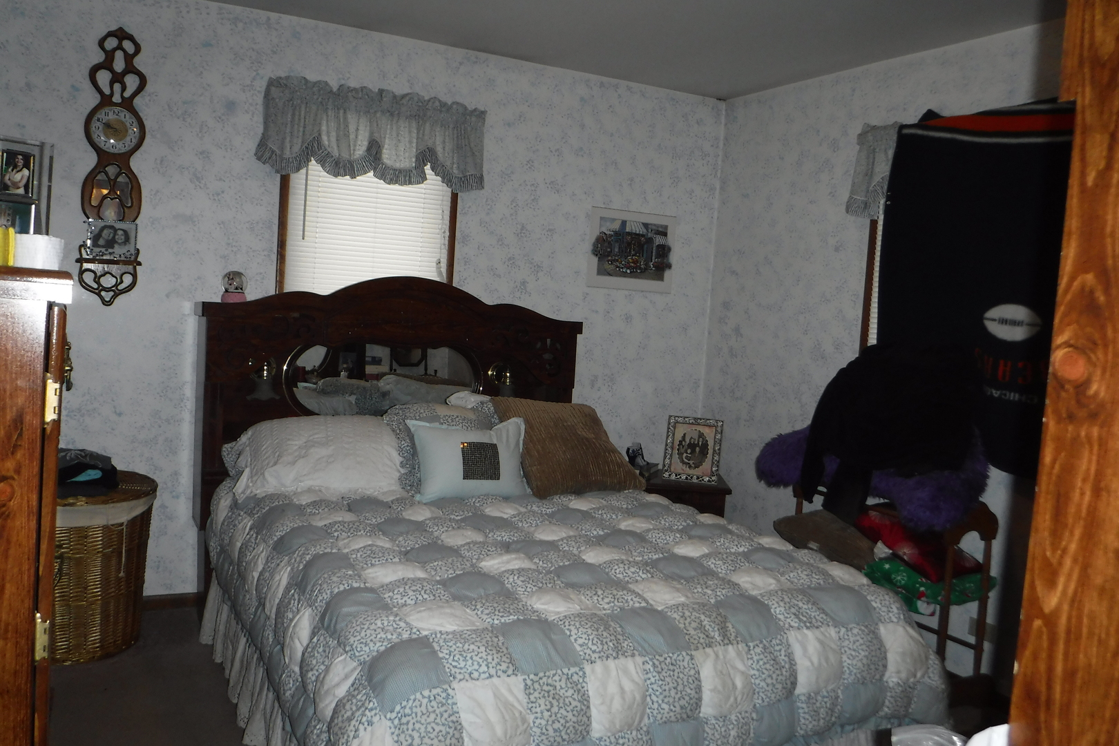 14447 Ridgeway Avenue Midlothian, IL 60445 - Photo 12 of 21 a bedroom with a bed and a mirror