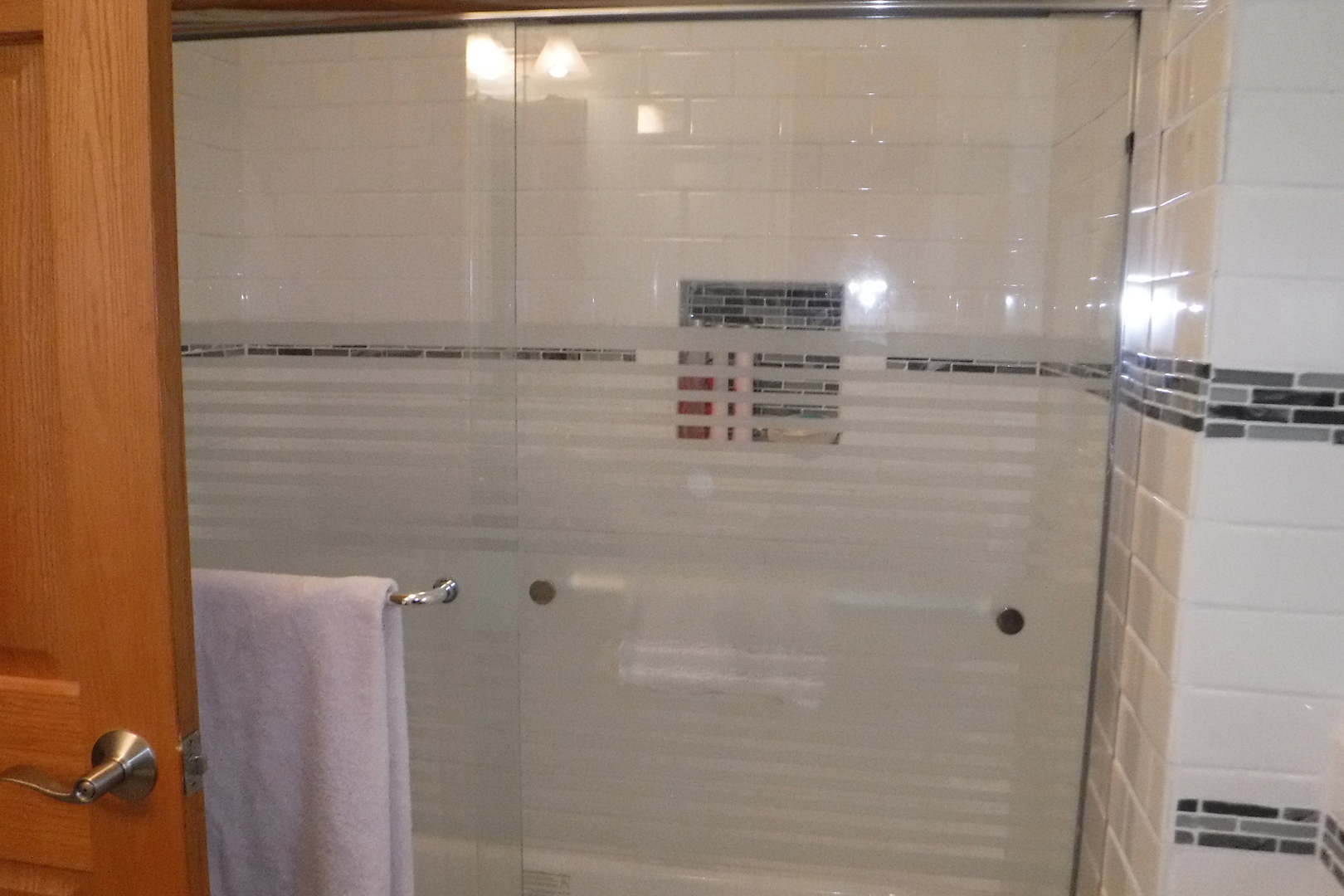 14447 Ridgeway Avenue Midlothian, IL 60445 - Photo 17 of 21 a bathroom with a shower