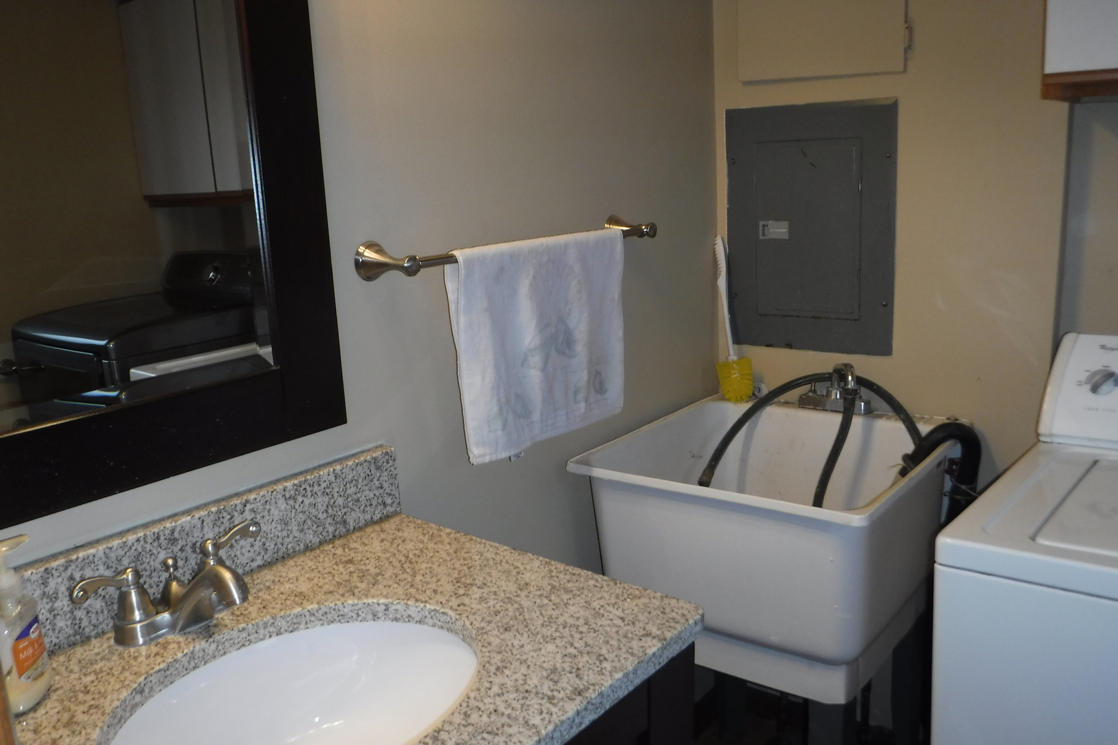 14447 Ridgeway Avenue Midlothian, IL 60445 - Photo 18 of 21 a bathroom with a granite countertop sink a mirror and vanity