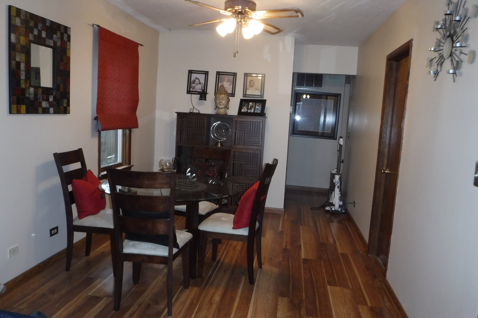 14447 Ridgeway Avenue Midlothian, IL 60445 - Photo 8 of 21 a view of a dining room with furniture and wooden floor