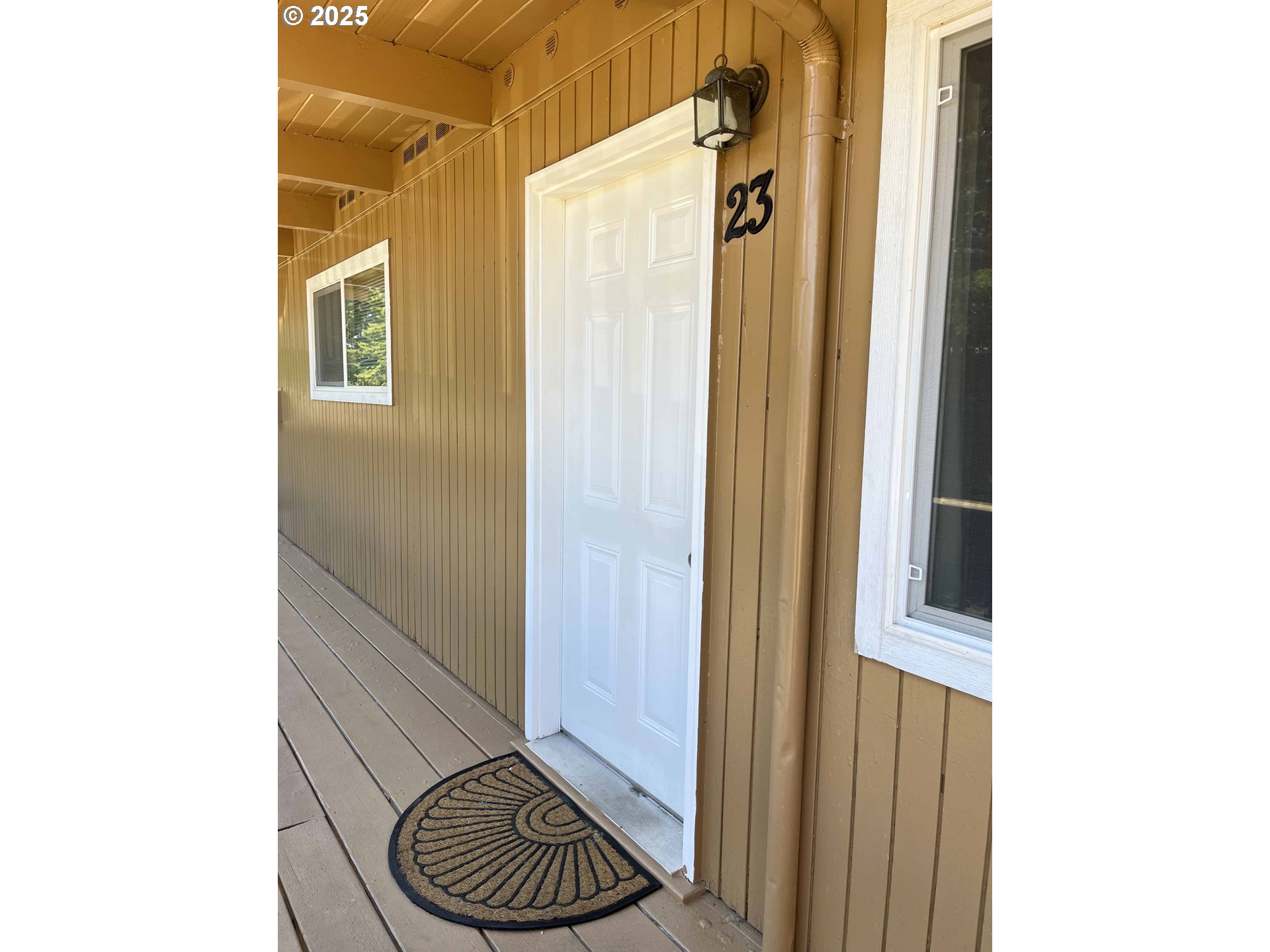 1260 10th Street, Unit 23 Florence, OR 97439 - Photo 18 of 19 a bathroom with a sink and a mirror