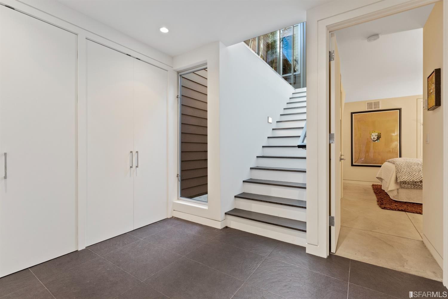172 Prentiss Street San Francisco, CA 94110 - Photo 2 of 73 Formal entry with double closets and atrium maintenance access