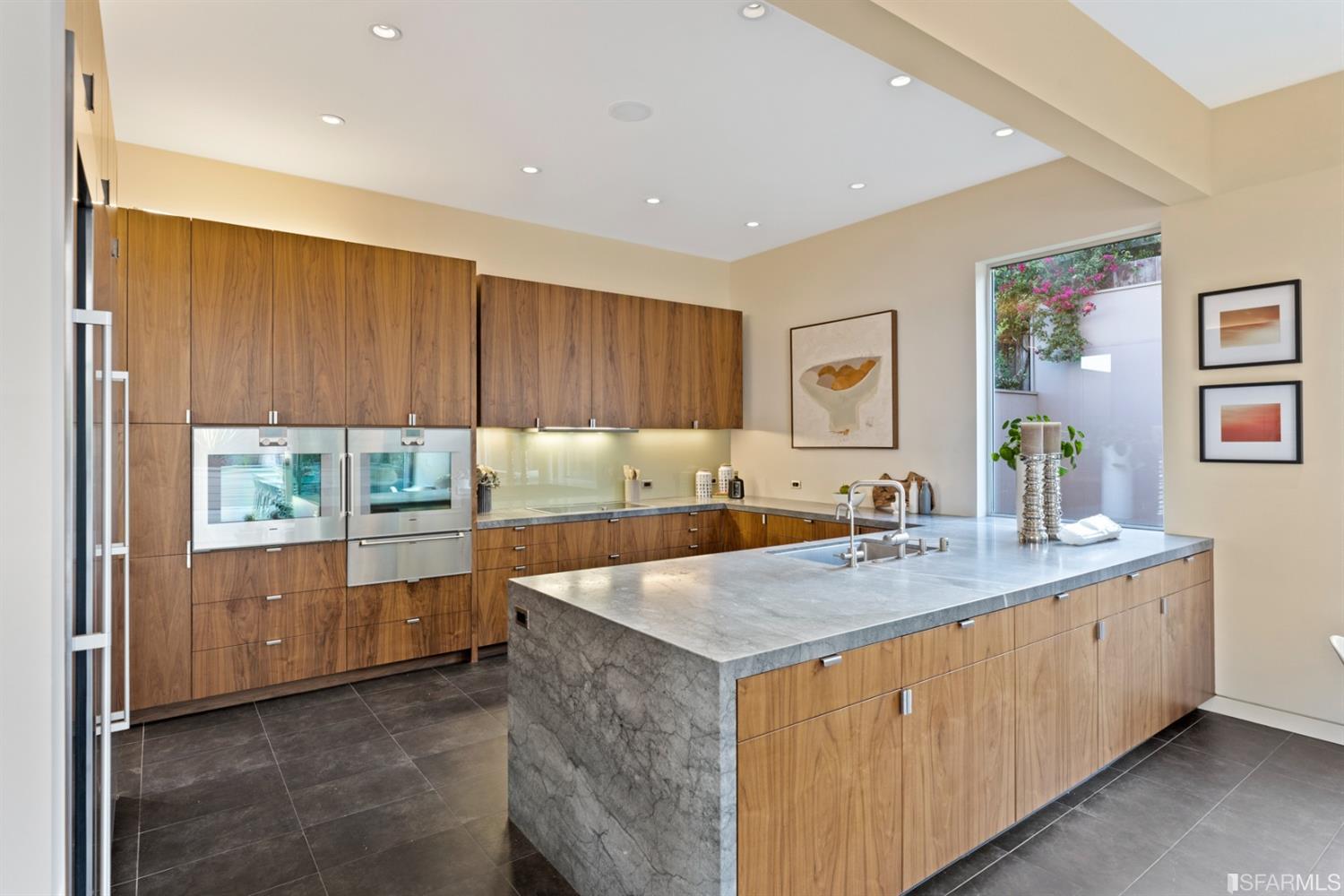 172 Prentiss Street San Francisco, CA 94110 - Photo 21 of 73 Kitchen with Vicostone Blue Savoy quartz countertops with waterfall edge