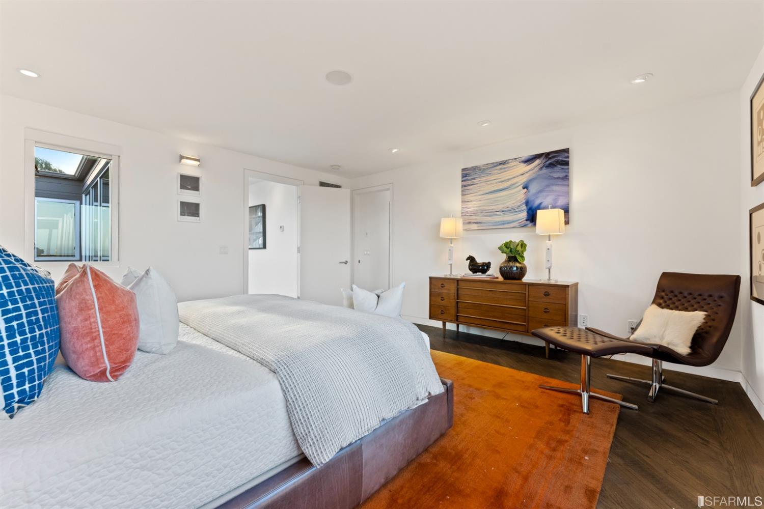 172 Prentiss Street San Francisco, CA 94110 - Photo 41 of 73 Primary suite includes air conditioning and hardwood floors.