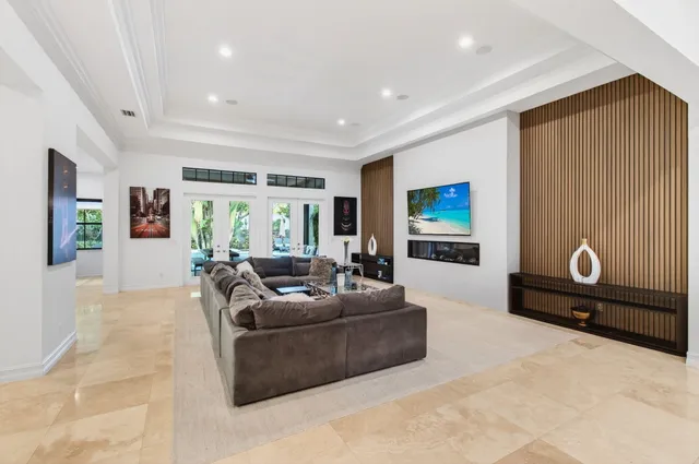 a kitchen with stainless steel appliances granite countertop a sink and a stove