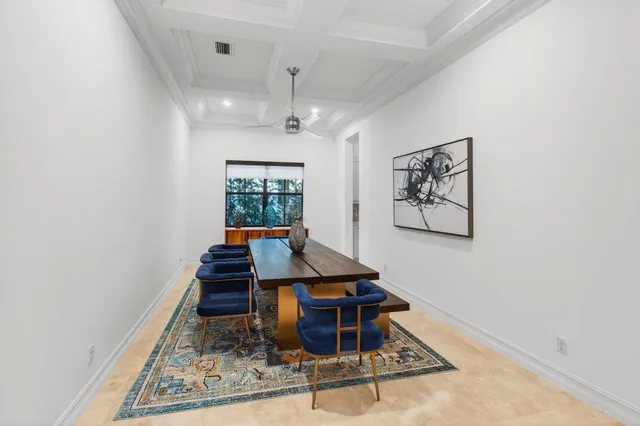 a spacious bathroom with a double vanity sink mirror and bathtub