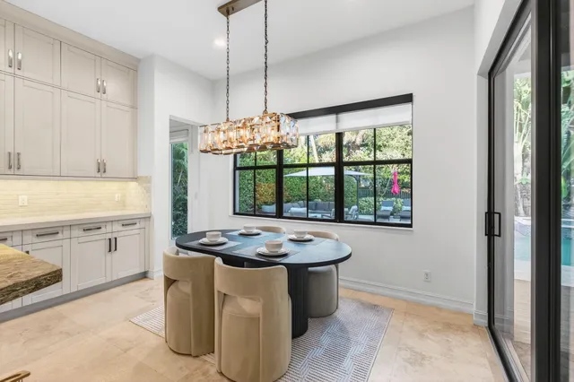 a room with lots of books and a book shelf