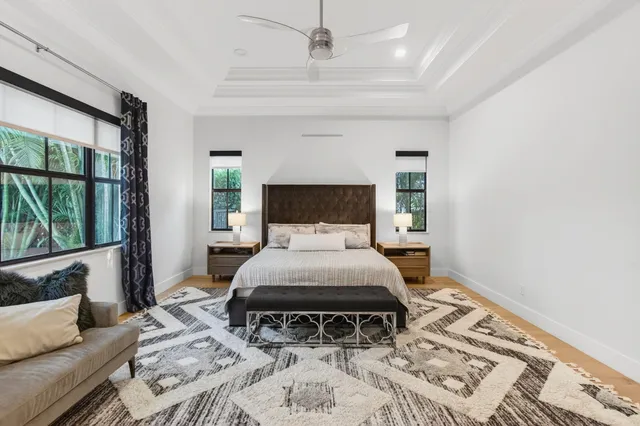 a view of a house with swimming pool and a yard