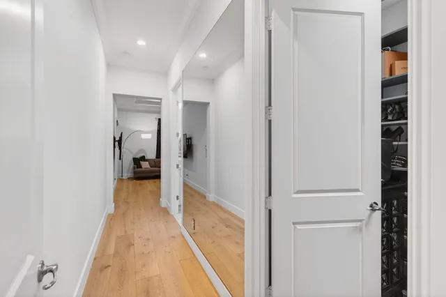 an aerial view of residential houses with outdoor space and street view