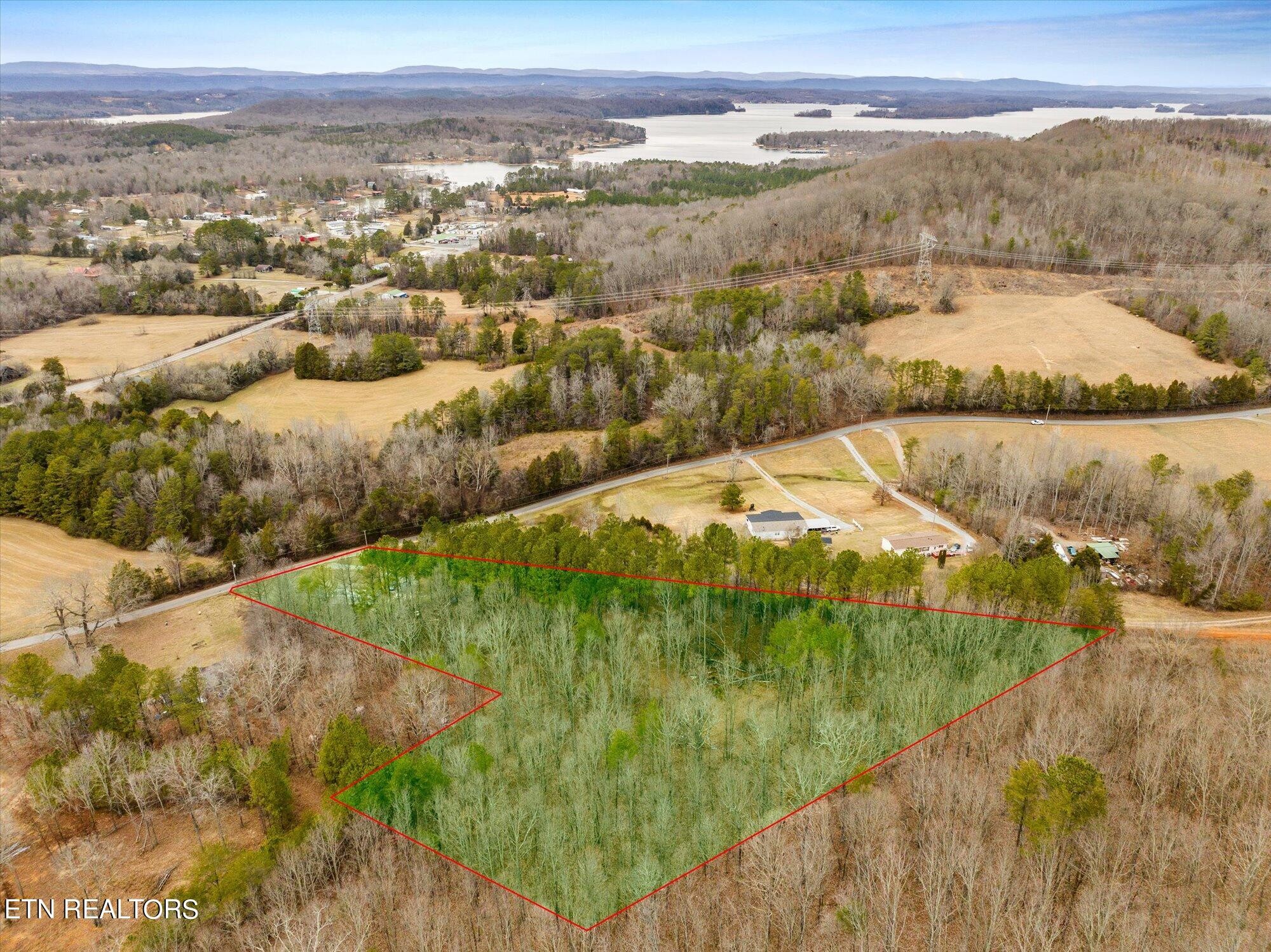 2785 Wasson Road Ten Mile, TN 37880 - Photo 1 of 16 a view of lake with mountain