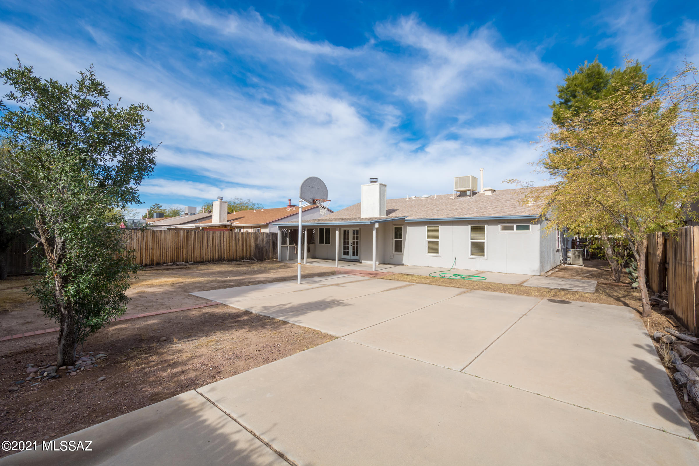 2631 West Firebrook Road Tucson, AZ 85741 - Photo 14 of 17 a view of a house with a patio