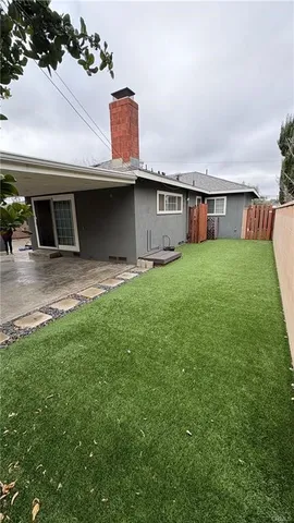 a house view with a garden space