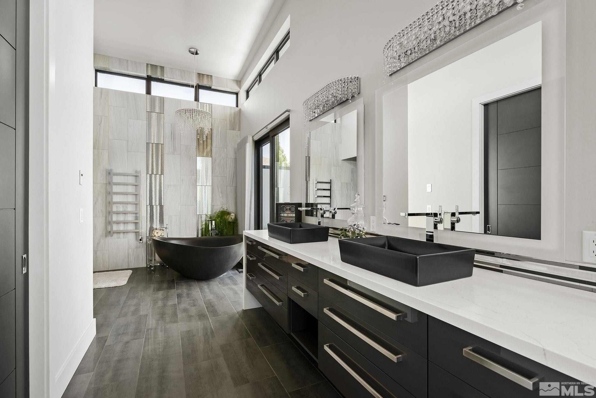 2385 Eagle Bend Trail Reno, NV 89523 - Photo 20 of 40 a large white kitchen with a large window and stainless steel appliances