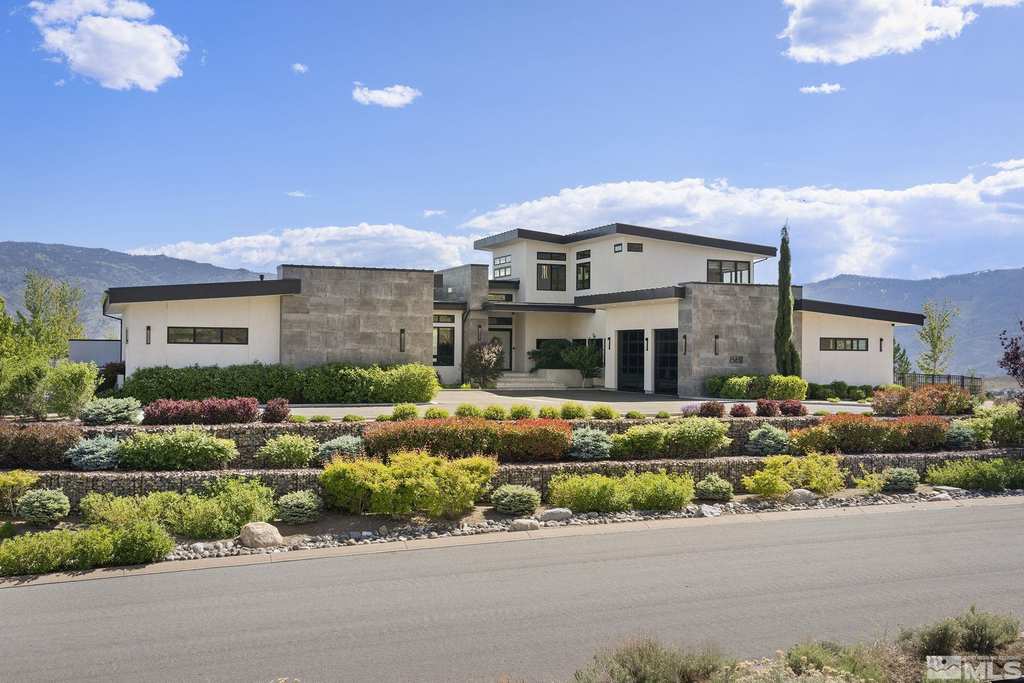2385 Eagle Bend Trail Reno, NV 89523 - Photo 2 of 40 a front view of a house with a yard and outdoor seating
