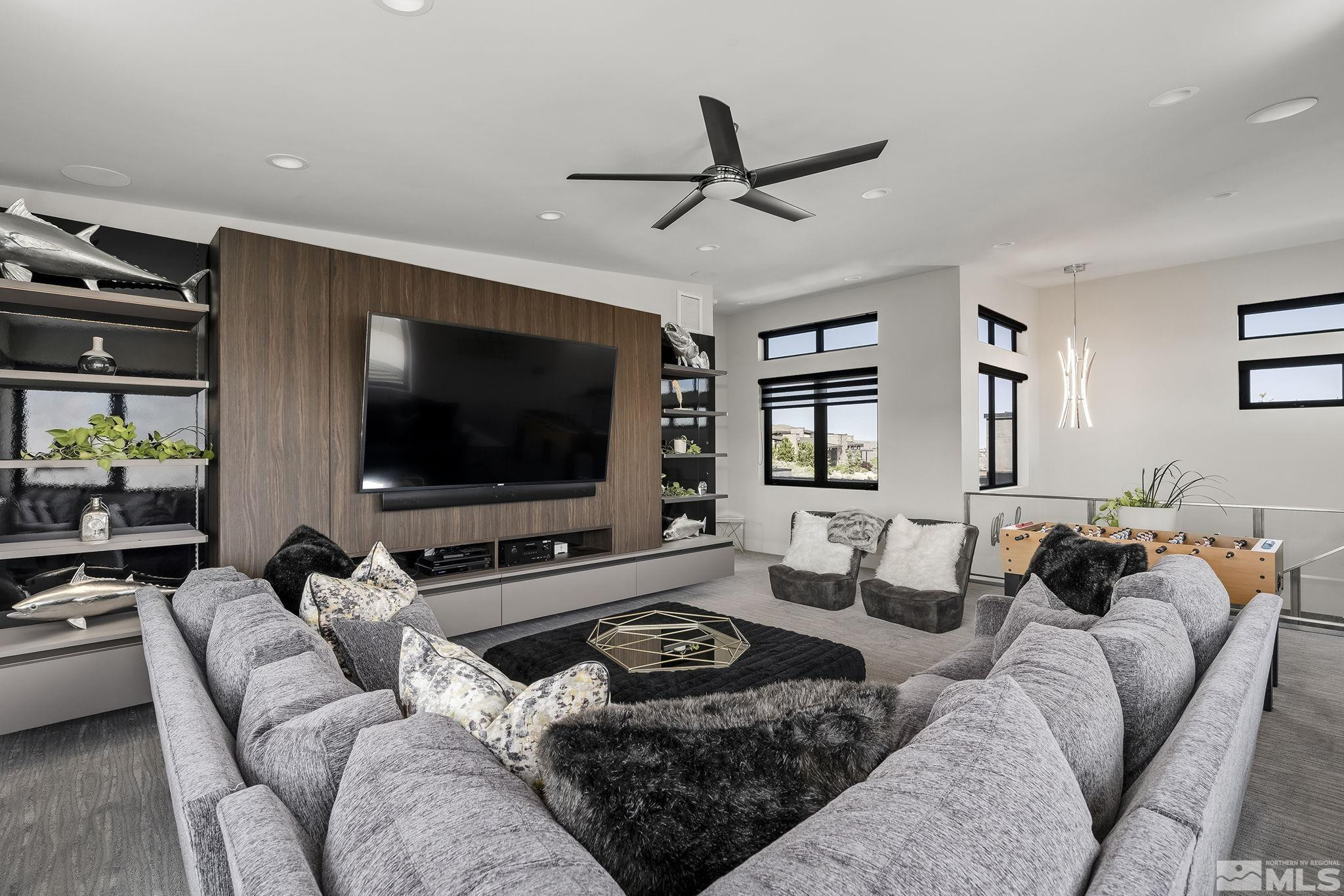 2385 Eagle Bend Trail Reno, NV 89523 - Photo 27 of 40 a living room with furniture and a flat screen tv