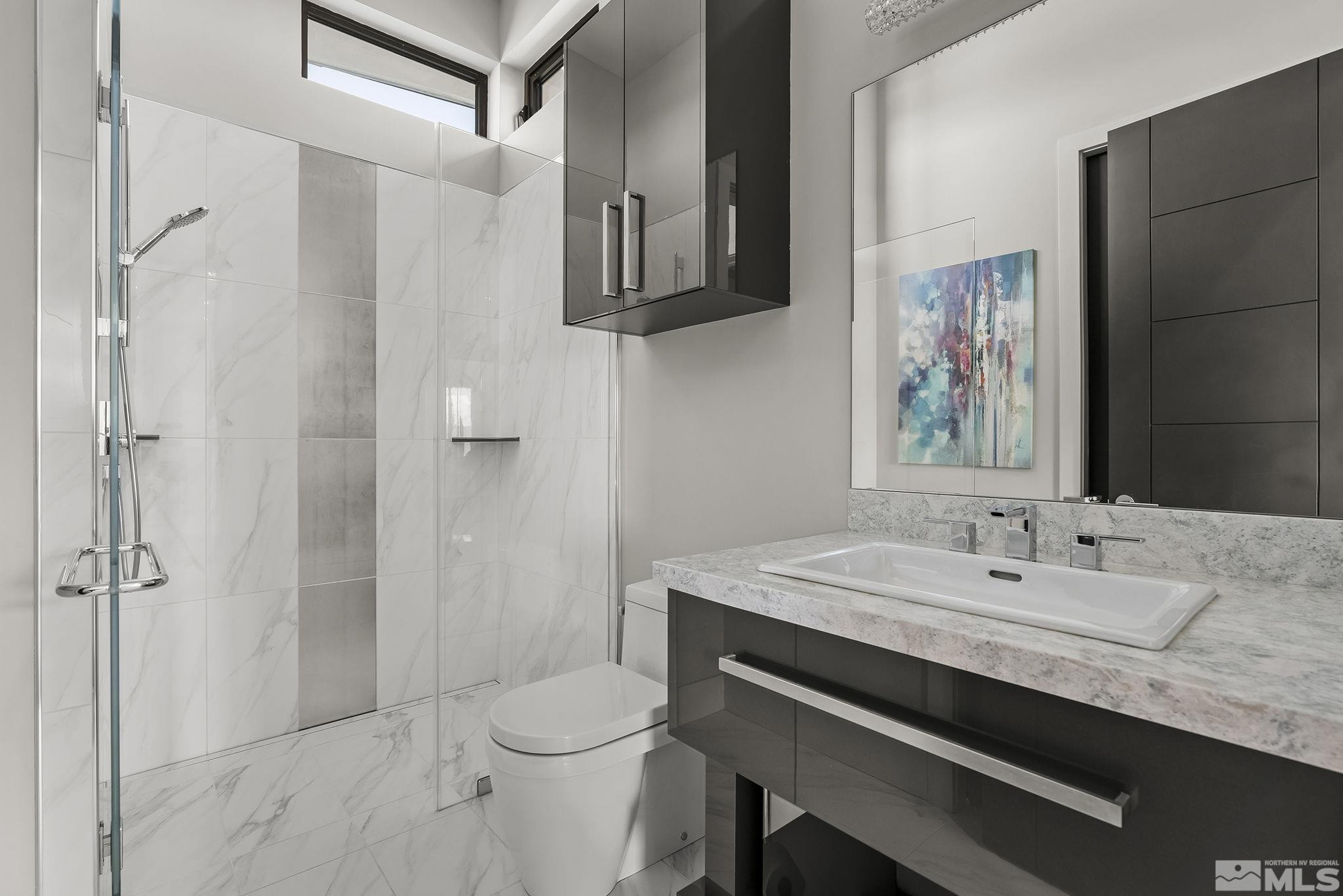 2385 Eagle Bend Trail Reno, NV 89523 - Photo 29 of 40 a bathroom with a sink a toilet and shower