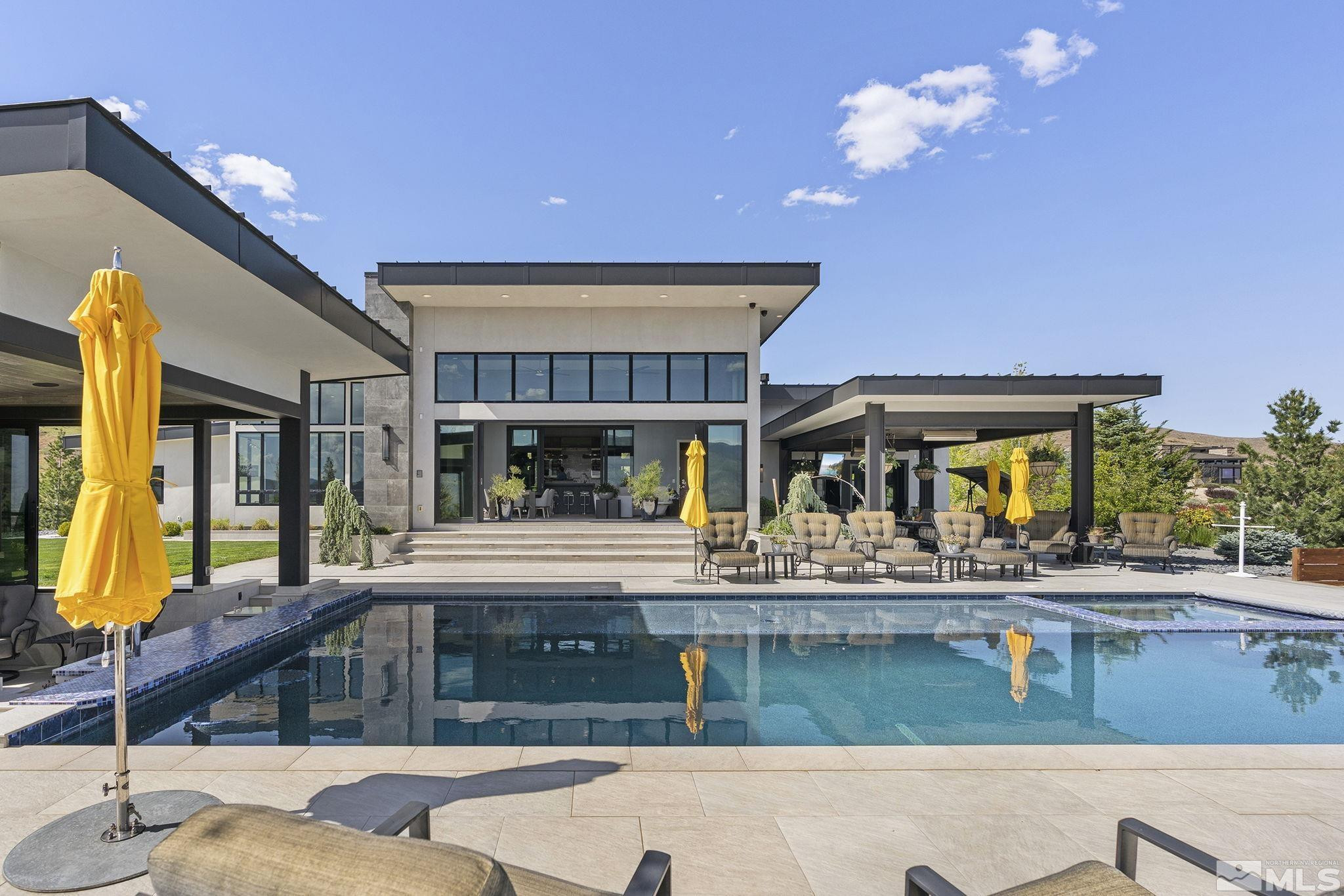 2385 Eagle Bend Trail Reno, NV 89523 - Photo 38 of 40 a living room with fireplace furniture and a large window