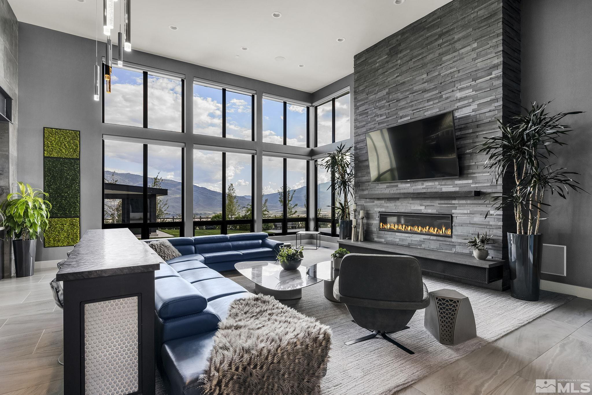 2385 Eagle Bend Trail Reno, NV 89523 - Photo 7 of 40 a living room with fireplace furniture and a flat screen tv