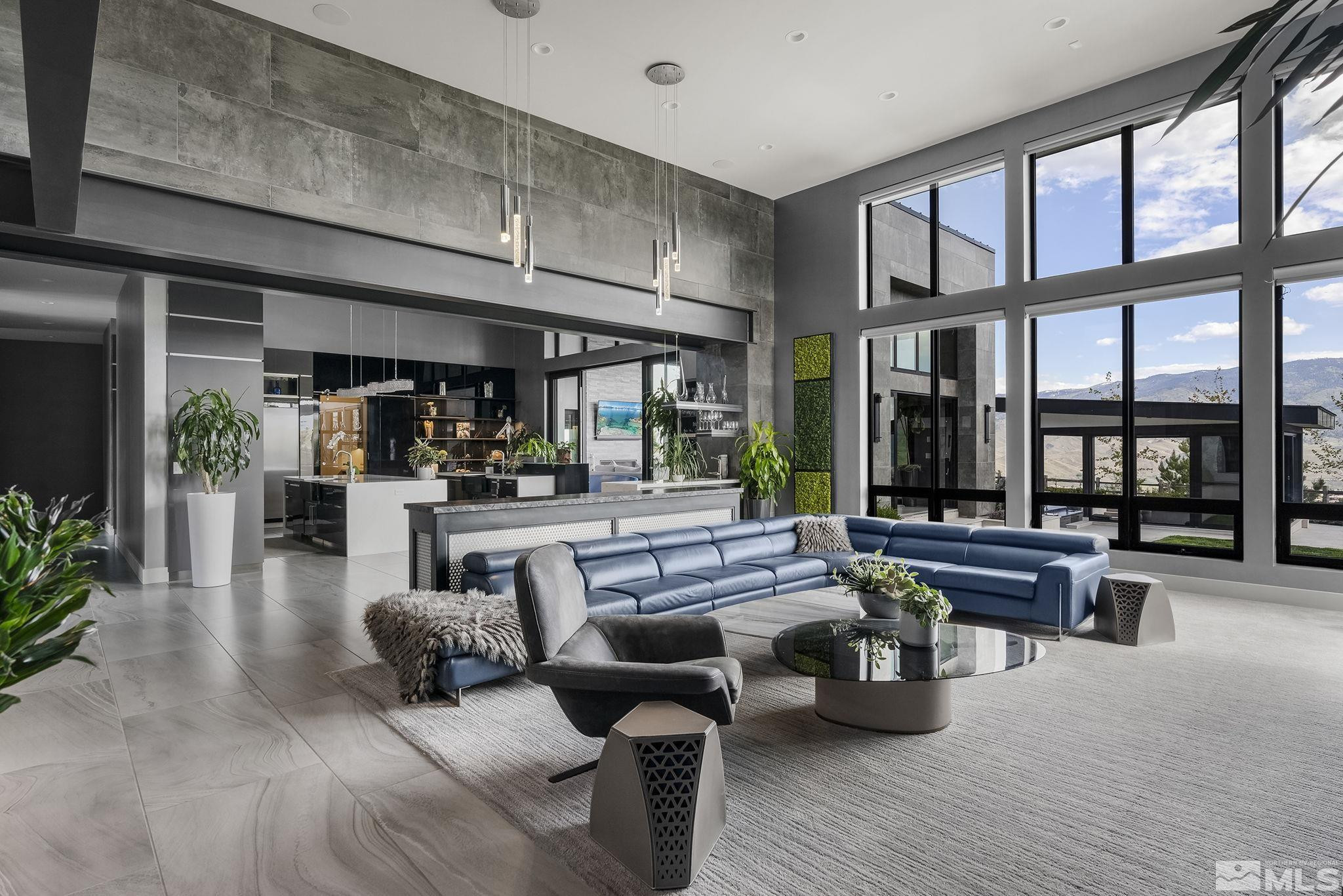 2385 Eagle Bend Trail Reno, NV 89523 - Photo 9 of 40 a living room with furniture large window and flat screen tv