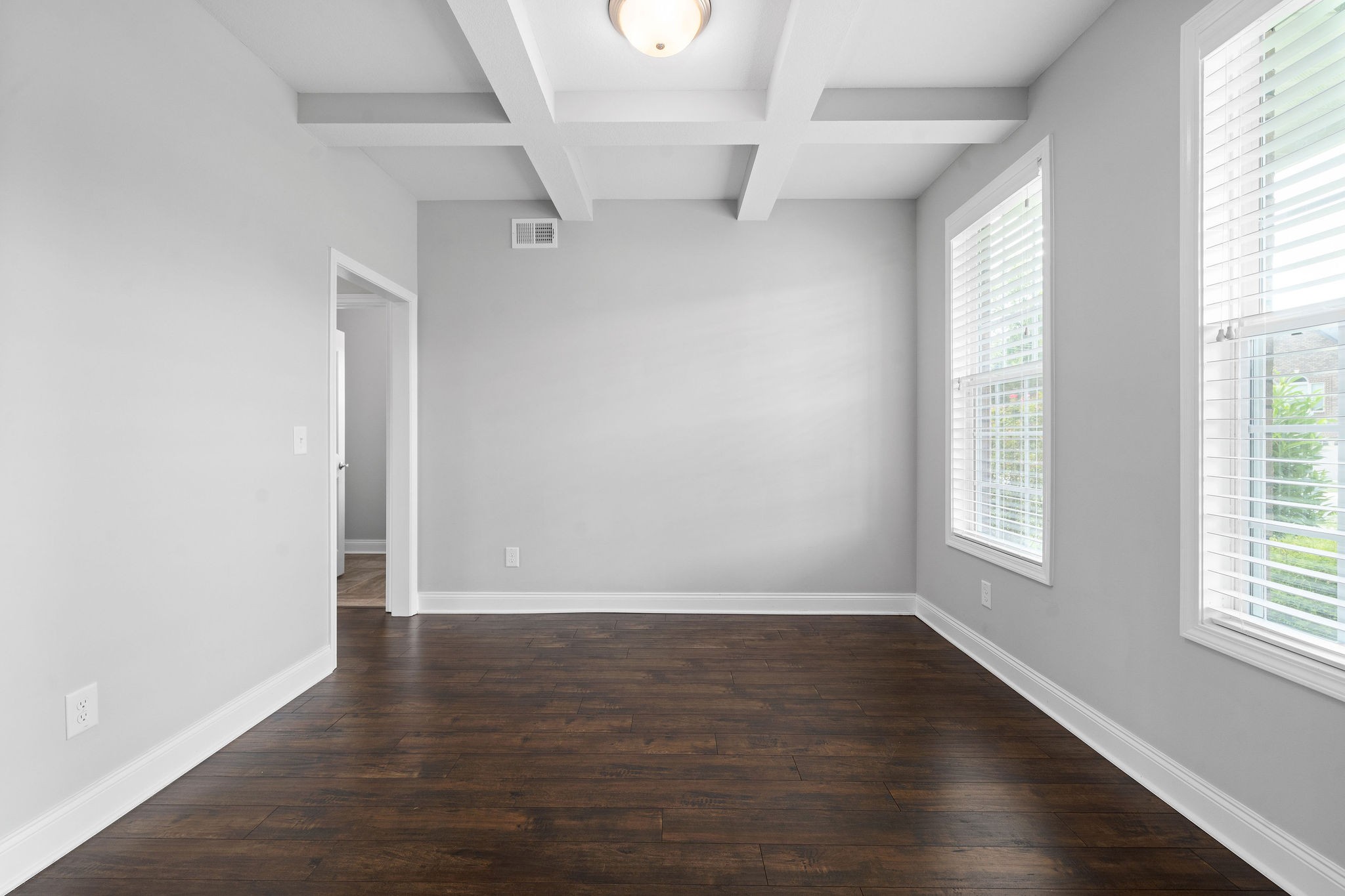 1008 Barnhill Road Clarksville, TN 37043 - Photo 23 of 44 an empty room with wooden floor and windows