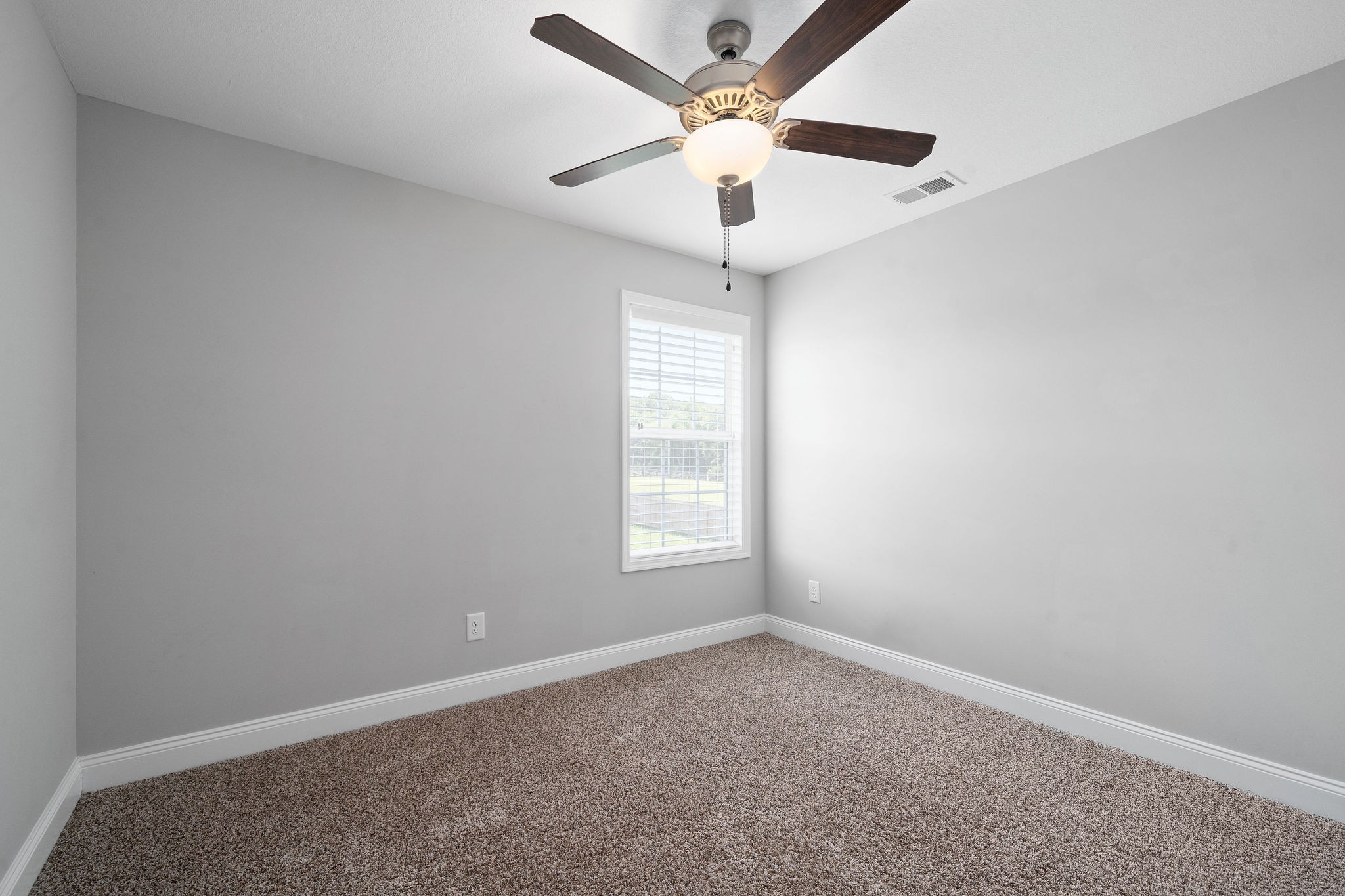 1008 Barnhill Road Clarksville, TN 37043 - Photo 34 of 44 an empty room with a window and a fan