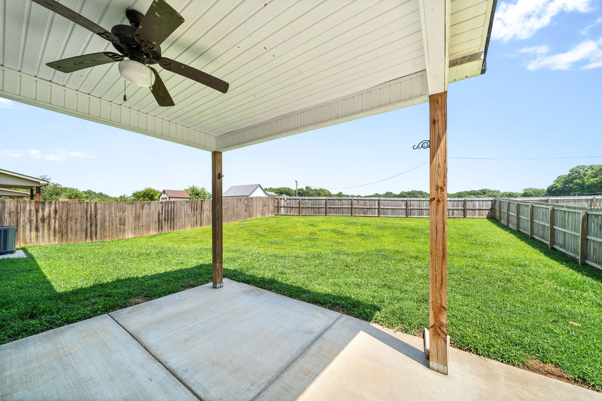 1008 Barnhill Road Clarksville, TN 37043 - Photo 39 of 44 a view of a backyard with table and chairs