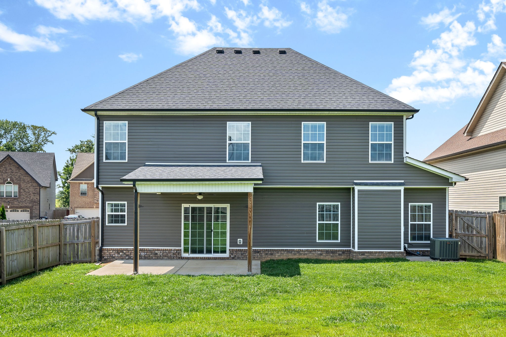1008 Barnhill Road Clarksville, TN 37043 - Photo 44 of 44 a front view of a house with a yard and green space