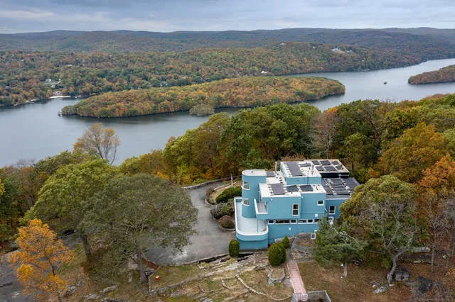 a view of a livingroom with furniture and front door