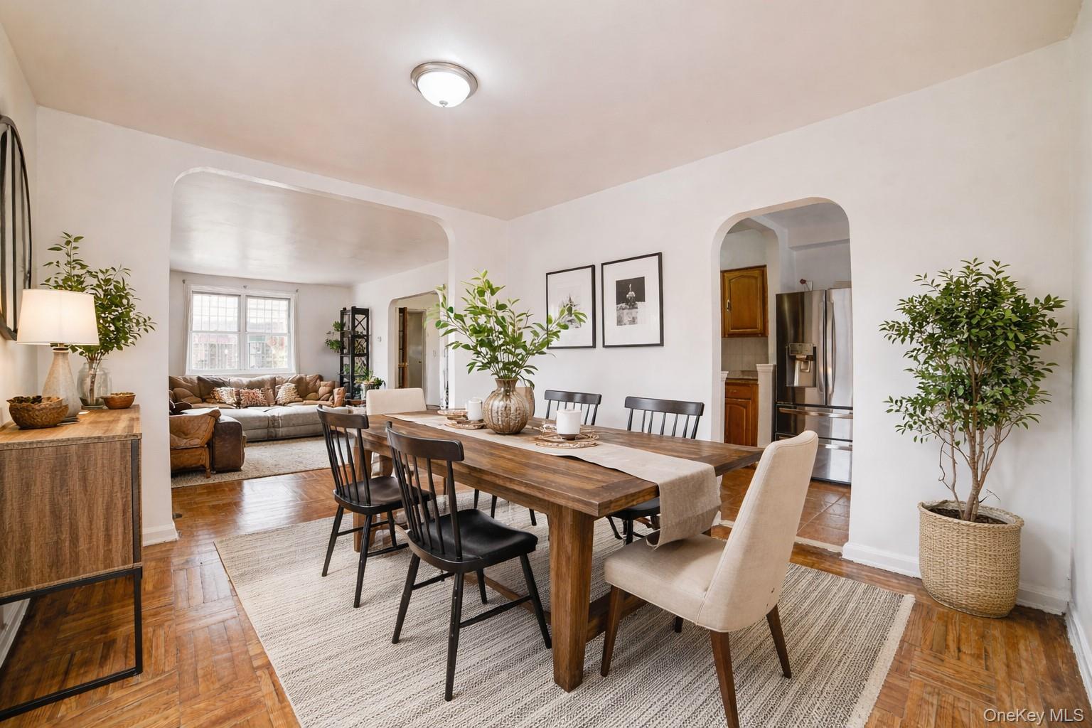 993 Duncan Street Bronx, NY 10469 - Photo 2 of 32 a view of a dining room with furniture and wooden floor