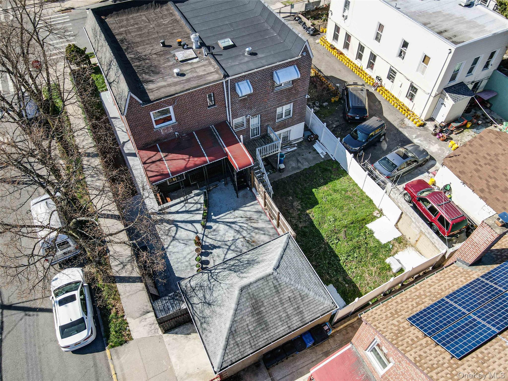993 Duncan Street Bronx, NY 10469 - Photo 31 of 32 an aerial view of a house with a yard