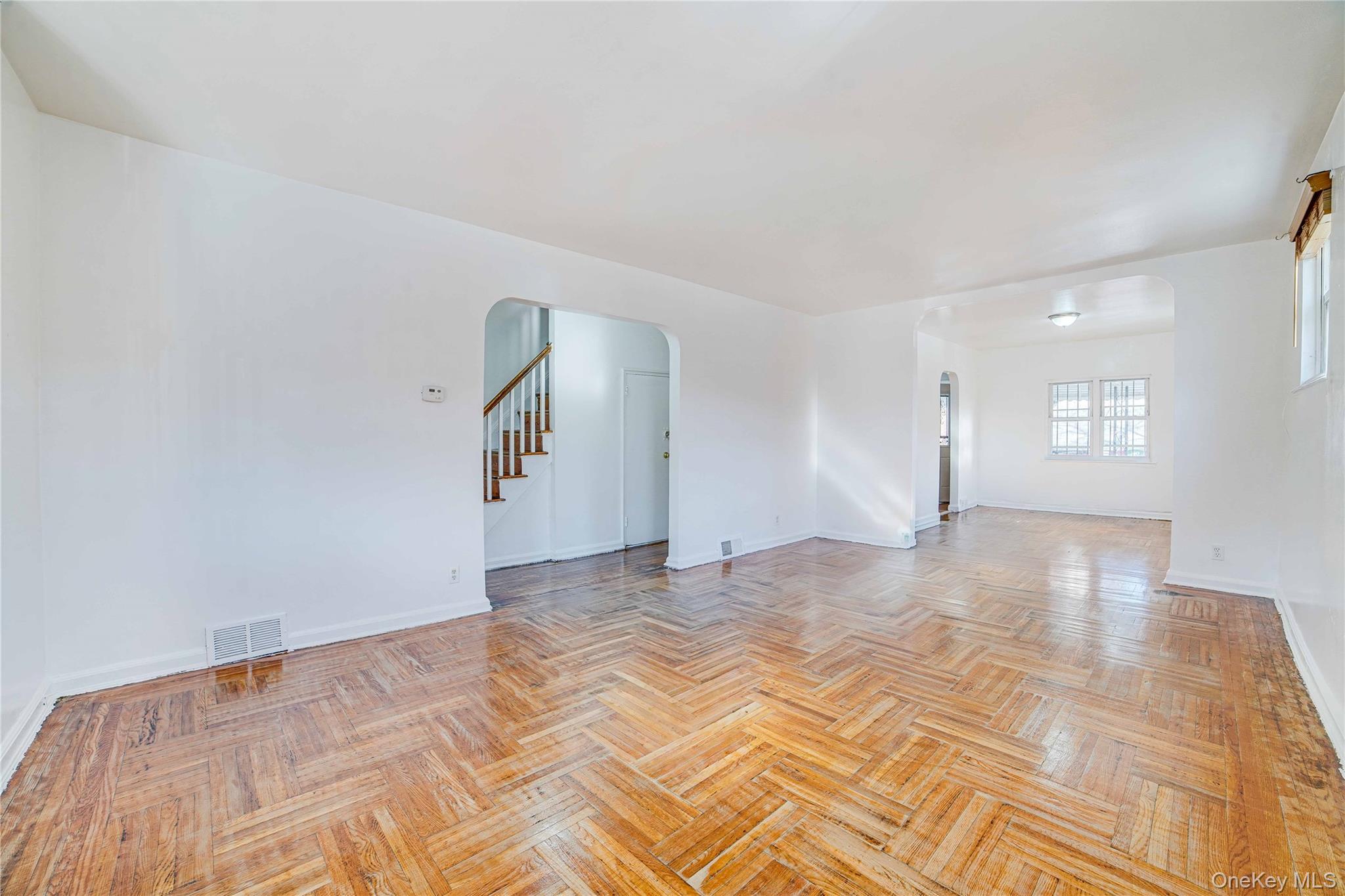 993 Duncan Street Bronx, NY 10469 - Photo 8 of 32 a view of an empty room and window