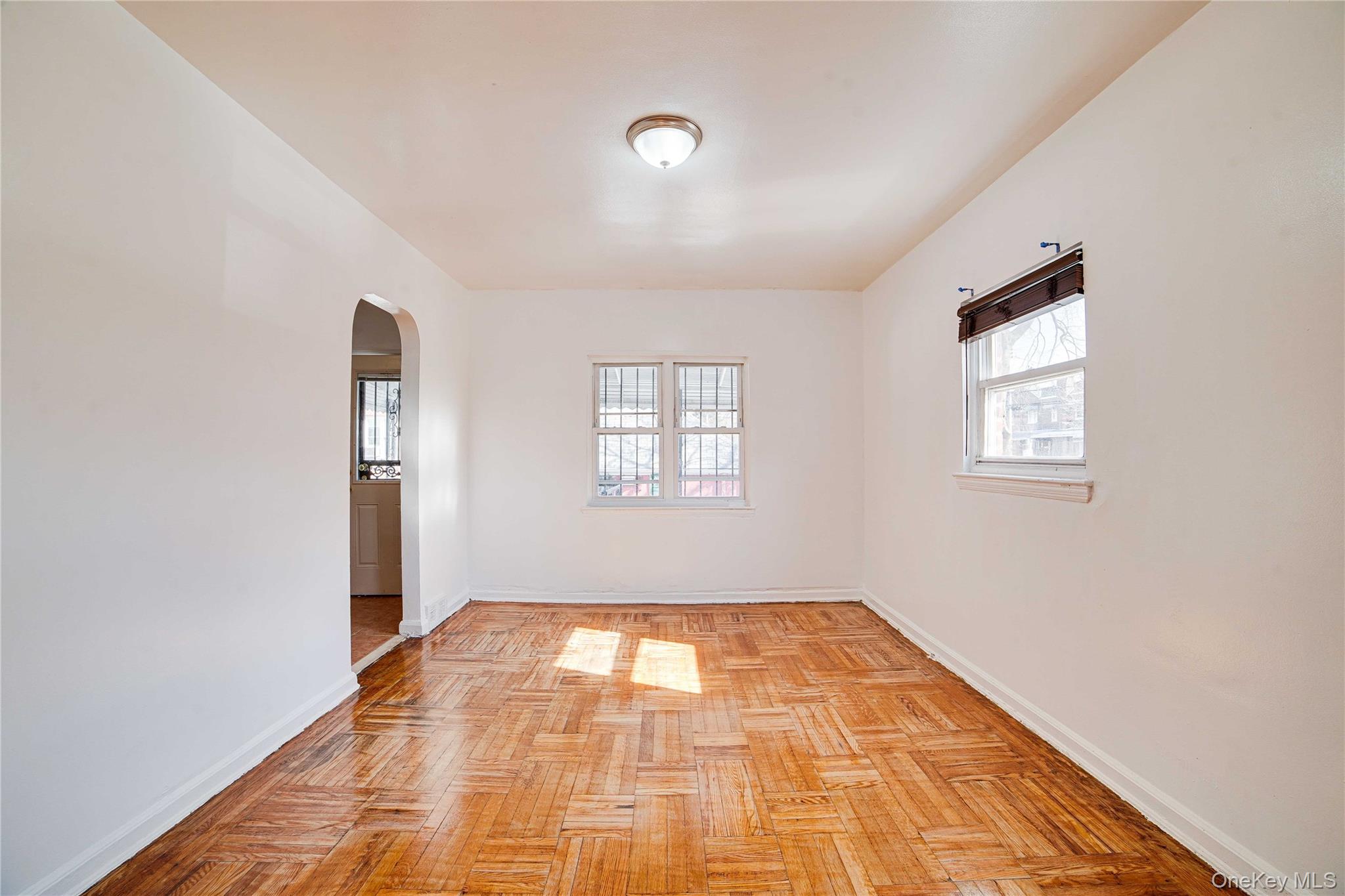 993 Duncan Street Bronx, NY 10469 - Photo 10 of 32 a view of empty room with wooden floor