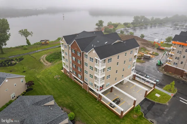 a aerial view of a house with a big yard