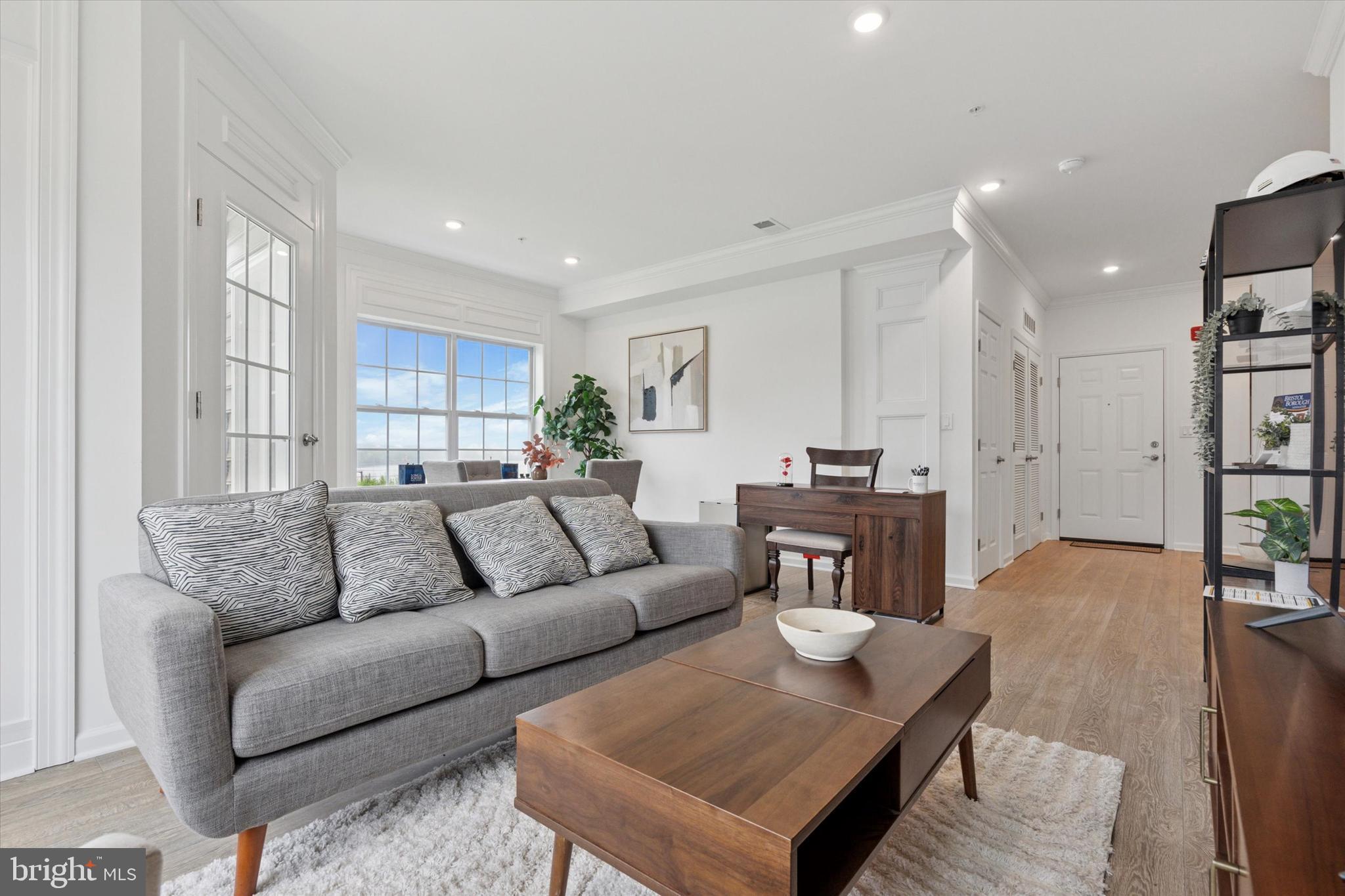 16241 River View Circle Bristol, PA 19007 - Photo 4 of 47 a living room with furniture and a wooden floor