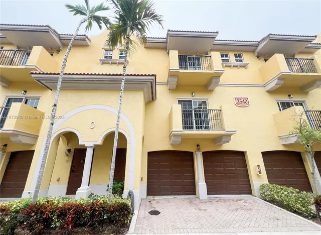 a front view of a multi story residential apartment building