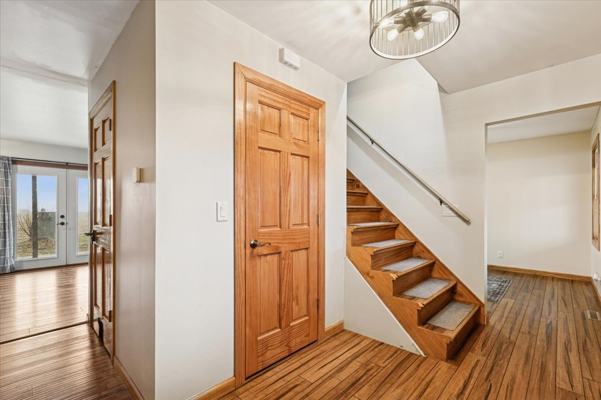 3326 Hayes Road Steward, IL 60553 - Photo 3 of 22 a view of entryway and hall with wooden floor