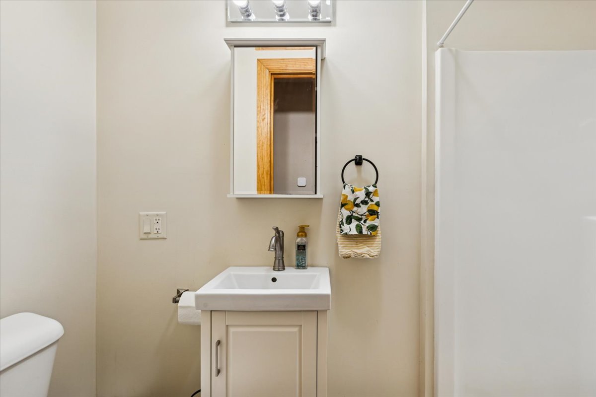 3326 Hayes Road Steward, IL 60553 - Photo 9 of 22 a bathroom with a sink and a toilet