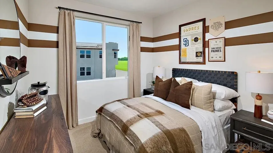 483 Gadget Road San Marcos, CA 92078 - Photo 14 of 20 a bedroom with a bed and a cabinets